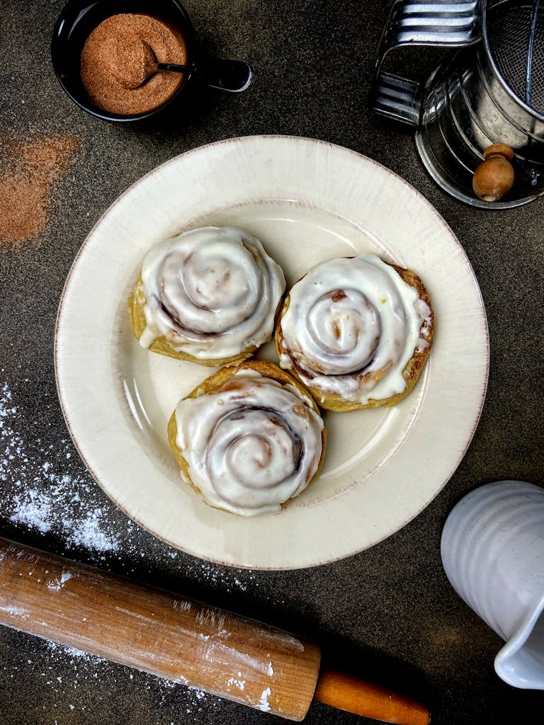 A Cinnamon Rolls on a Ceramic Plate